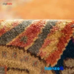 Handwoven Carpet Red Floral Design pile texture close-up (Detail view)