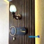 In-room view of Art Novin Modern Wall Clock Stylish Design Quartz styling and size reference