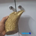 Packaging view of Chingan Bronze Eagle Head Sculpture label and