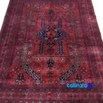 Weave close-up of Handwoven Carpet Red Luxurious Design Hand wash material and craftsmanship