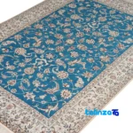 Detail view of Nain Handwoven Carpet Green-Blue Floral Design pile texture close-up