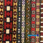 Detail view of Turkmen Handwoven Carpet Red Design pile texture close-up