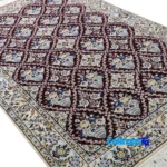 Detail view of Nain Handwoven Carpet Red Floral Design pile texture close-up