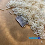 Detail view of Noor Hashemi Rice Organic Grade 1 nuts close-up texture