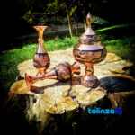 Detail view of Diamond Cut Copper Vase finish and material