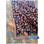 Weave close-up of YMM Handwoven Silk Rug Tree Design Navy material and craftsmanship