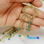 Detail view of Handcrafted Pearl and Agate Earrings by Artisan finish material