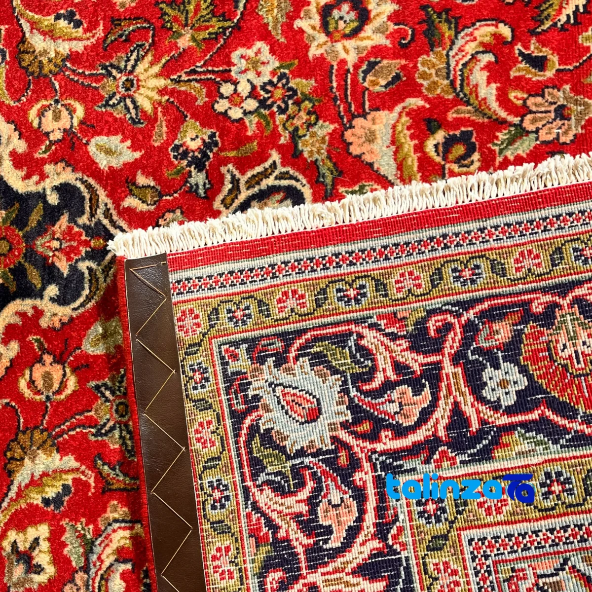 NKP Handwoven Carpet Red Design - Edge view showing border and finishing
