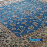 Edge view of Nain Handwoven Rug Square Design Soft Blue border and finishing