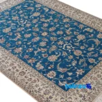 Nain Handwoven Carpet Green-Blue Floral Design - Edge view showing border and finishing