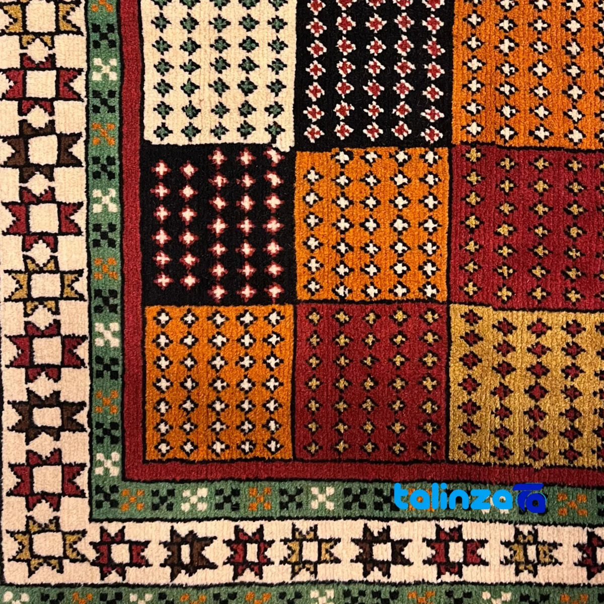 Corner detail of Turkmen Handwoven Carpet Red Design binding and edges