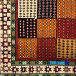 Corner detail of Turkmen Handwoven Carpet Red Design binding and edges