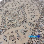 Edge view of Nain Handwoven Rug 1. Design Lajak Toranji border and finishing