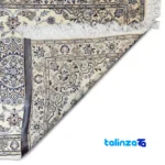 Corner detail of Nain Handwoven Rug Cream Design Hand wash only binding and edges