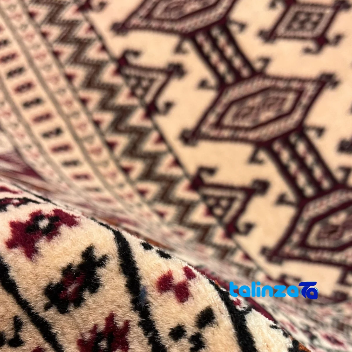 Corner detail of Turkmen Handwoven Carpet Red Design Hand wash binding and edges
