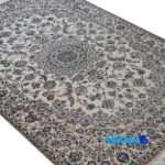 Corner detail of Nain Handwoven Carpet Latchak Design Cream binding and edges