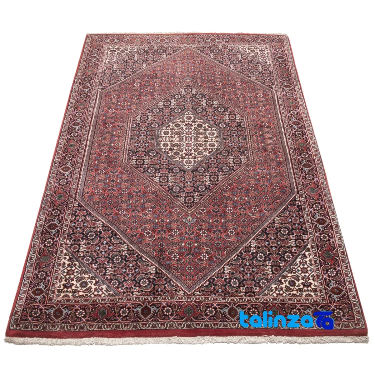 Corner detail of Persia Handwoven Rug Red Design binding and edges