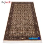 Corner detail of C Persia Handwoven Rug - Elegant Cream Design binding and edges