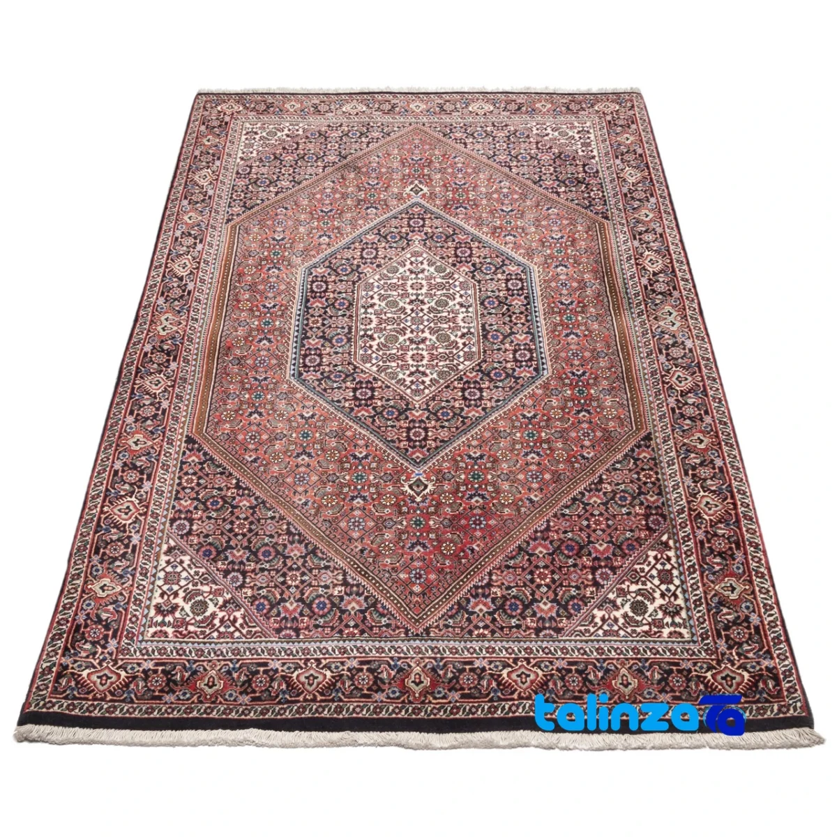 Edge view of Cypress Persian Handwoven Rug Red border and finishing
