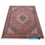 Corner detail of Si Persia Handwoven Rug Elegant Design binding and edges