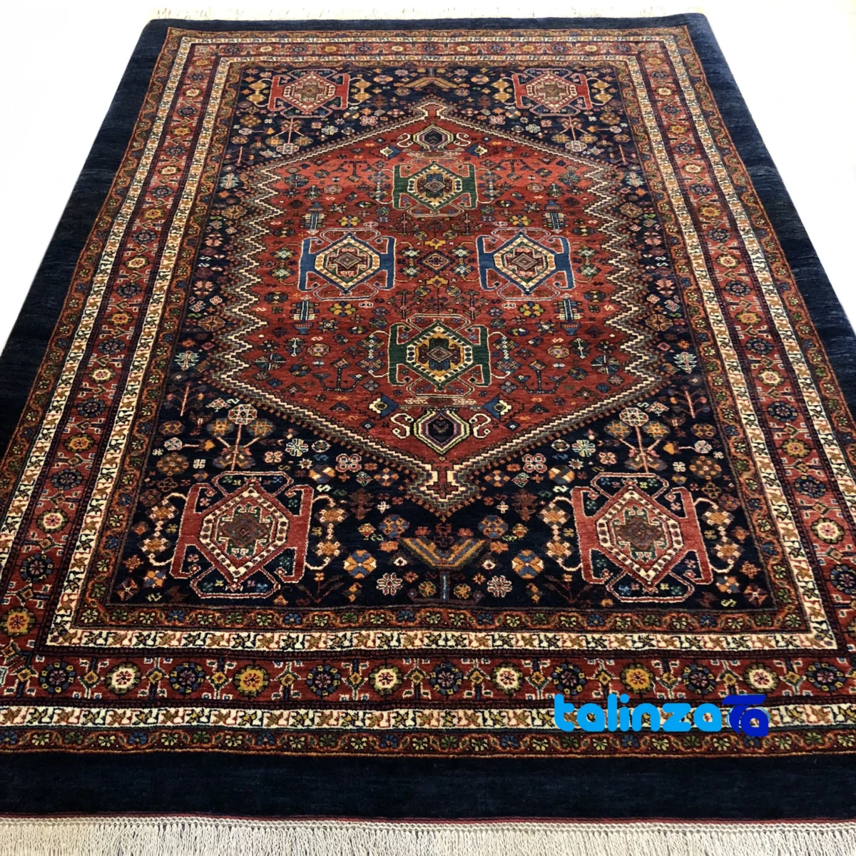 Corner detail of Qashqai Handwoven Carpet Traditional Design binding and edges