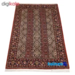 Corner detail of C Persia Handwoven Rug - Colorful Fish Design binding and edges