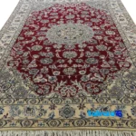 Edge view of Nain Handwoven Rug - Rich Red Design 210 x 135 0. border and finishing