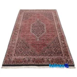 Corner detail of Si Persia Handwoven Rug Red 184x110 cm binding and edges