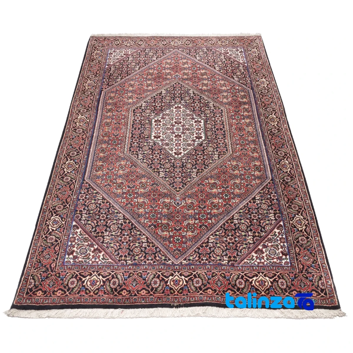 Corner detail of Si Persia Handwoven Rug Red binding and edges