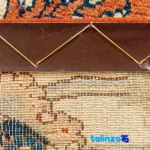 Corner detail of Handwoven Carpet by Brand - Traditional Design binding and edges
