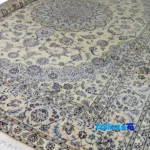 Edge view of Nain Handwoven Carpet Cream Design border and finishing