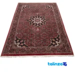 Corner detail of Persia Handwoven Carpet Red Luxurious Design binding and edges
