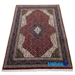 Edge view of Persia Handwoven Carpet Luxurious Red Design border and finishing