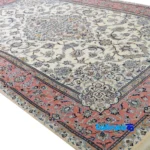 Edge view of Mortazavi Nain Handwoven Rug Cream border and finishing