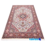 Corner detail of C Persia Handwoven Area Rug Elegant Cream Design binding and edges