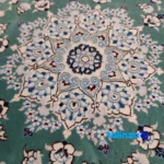 Nain Handwoven Round Rug Green - Corner detail showing binding and edges