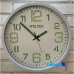 Mounting detail of Welder Quartz Wall Clock Night Glow Feature back panel and hook