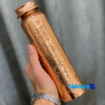 Zanjan Copper Bottle Hammered Finish and material detail view)