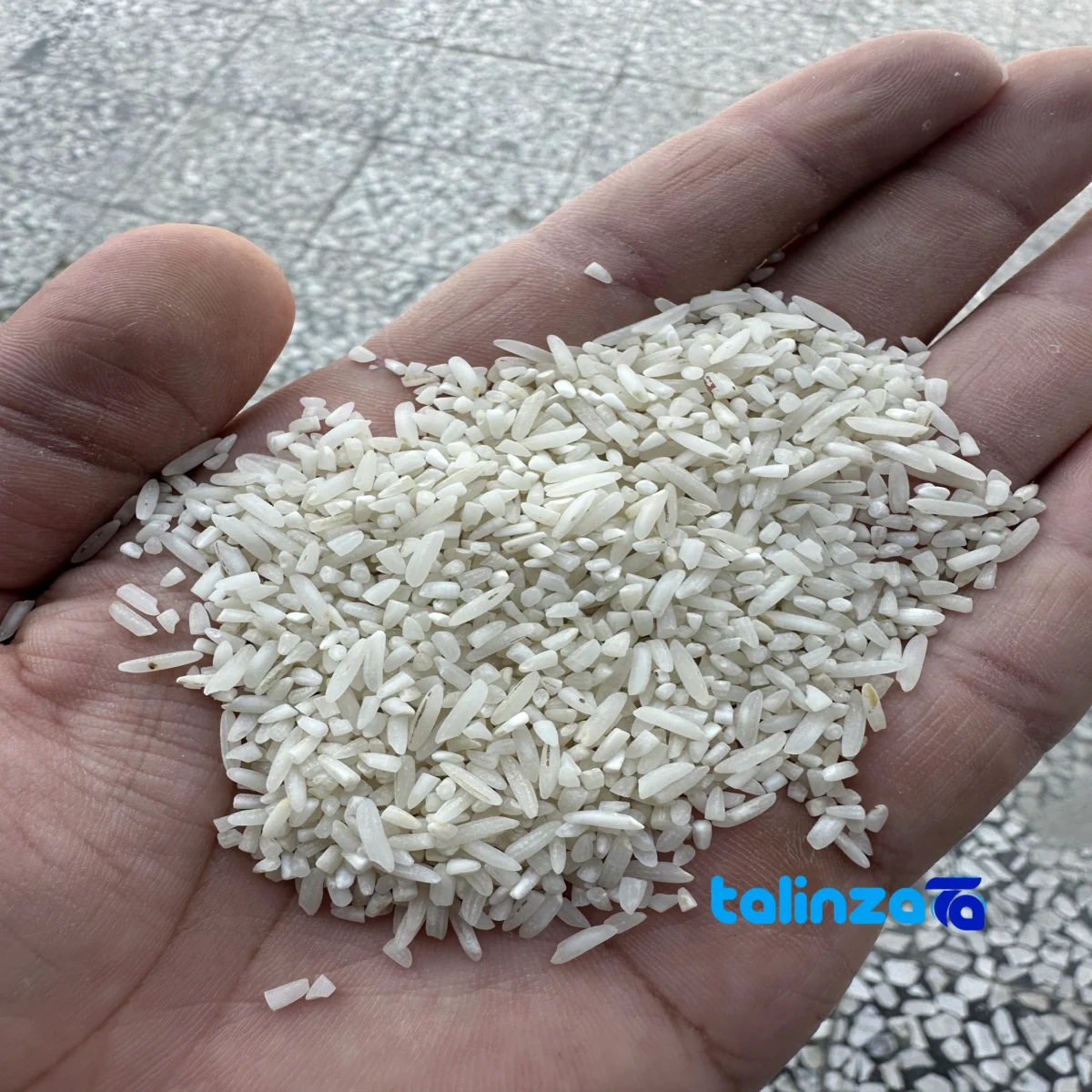 Packaging view of ZarrinKhoshe Tabarestan Broken Rice HighYield Fajr bag seal and material