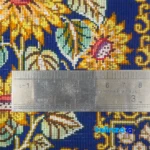 Edge view of TGH Handwoven Carpet Floral Design border and finishing