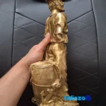 Bronze Sailor Figurine Anchor & Fish Barrel - Side view showing profile and structure