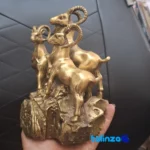 Side view of CHNA Bronze Sculpture Ram Design Rock Art profile and structure