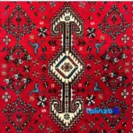 In-room view of Abadeh Handwoven Rug Red Traditional Design room styling and scale
