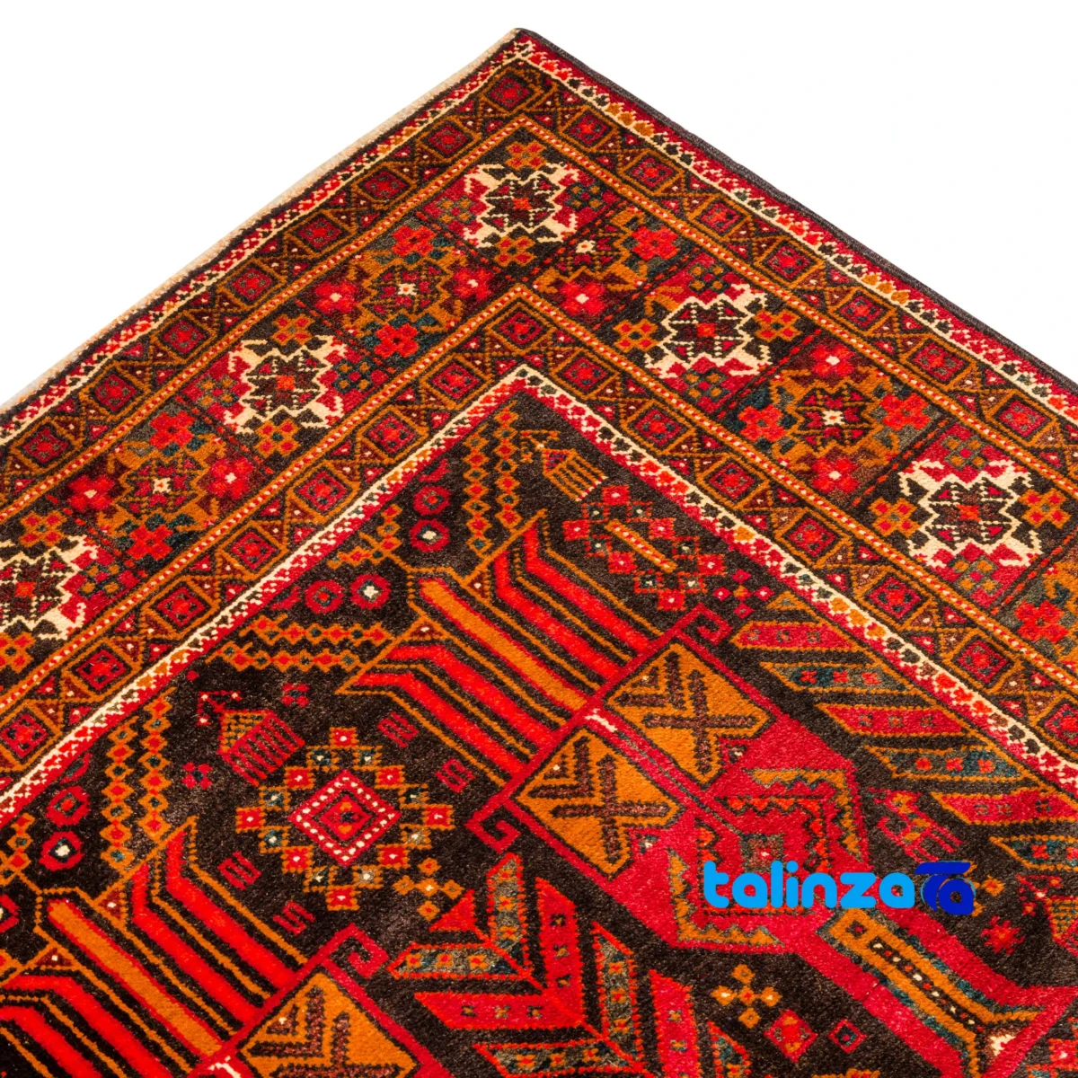 Handwoven Persian Rug Model Baloch Design - In-room view showing room styling and scale