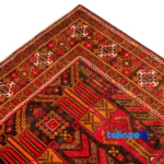 Handwoven Persian Rug Model Baloch Design - In-room view showing room styling and scale