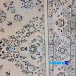 Nain Handwoven Rug 1. Design Lajak Toranji - In-room view showing room styling and scale