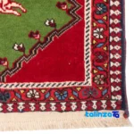 In-room view of Cypressia Handwoven Rug Green room styling and scale