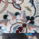 In-room view of Nain Handwoven Rug Elegant Design room styling and scale