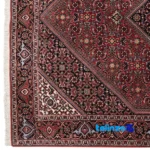In-room view of Cypress Persian Handwoven Rug Red room styling and scale