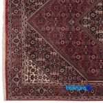 Room setting of Persia Handwoven Rug Red Design floor placement example